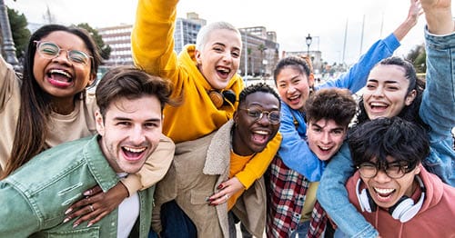 A group of online school students sharing their school spirit and interconnectedness.