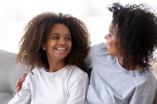 A mother and daughter discussing why school safety is important.