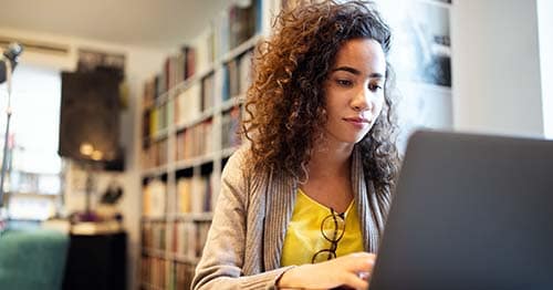 A high school student researching things to look for in colleges. 