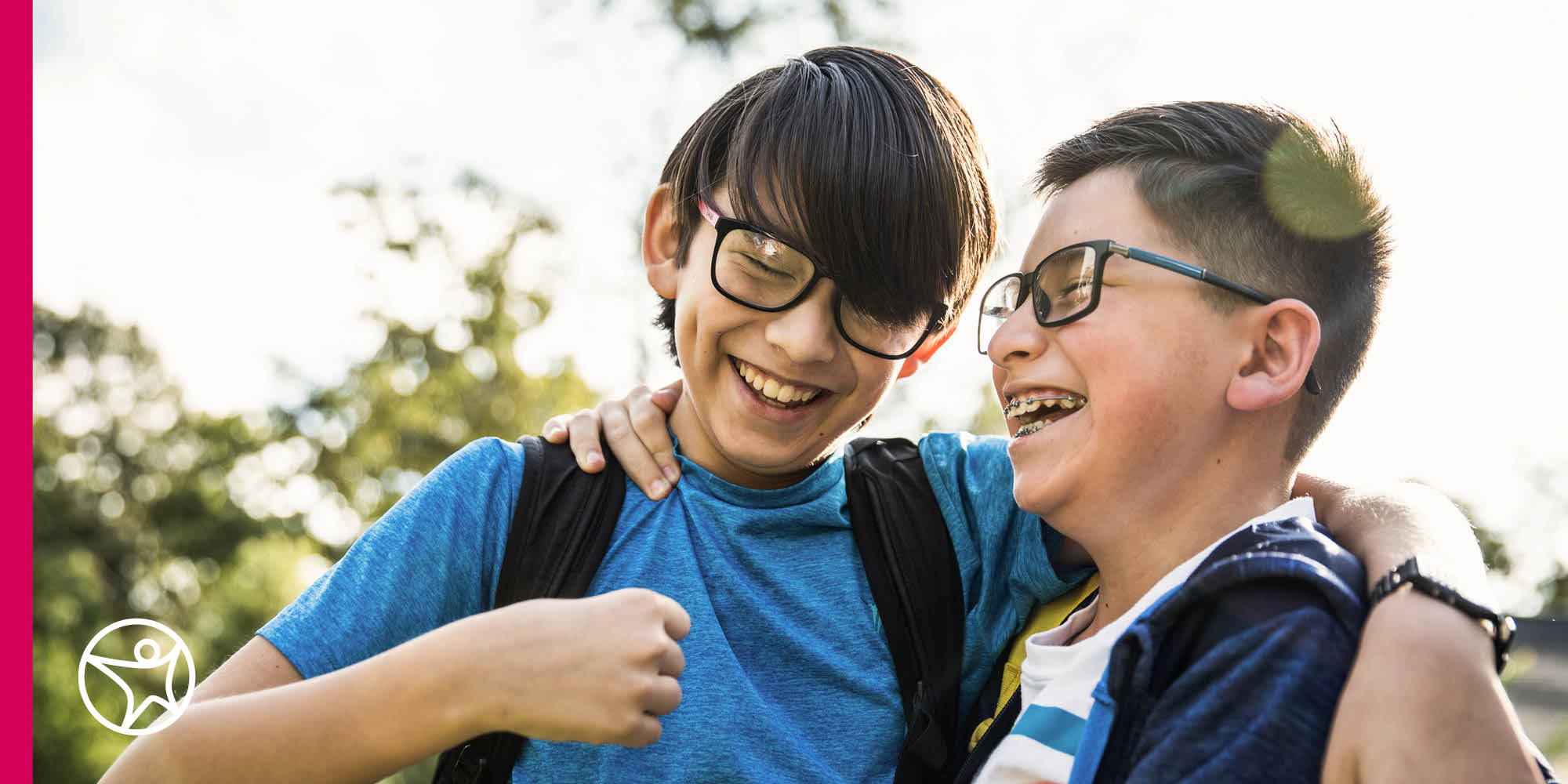 Two students are having fun outside