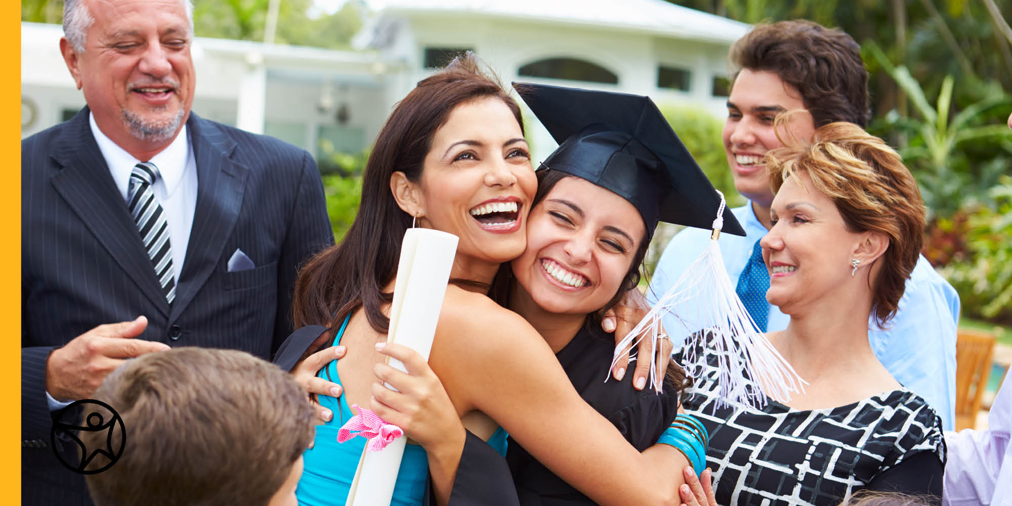 Family celebrating daughter's high school graduation