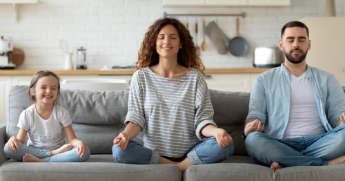 A family practicing mindfulness techniques for children