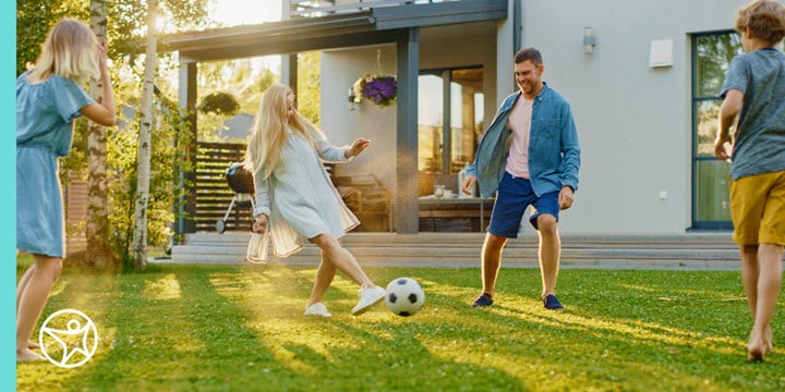 Two high school students playing soccer