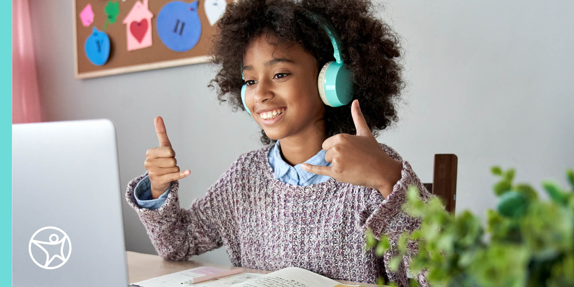 A young girl is participating in an online class