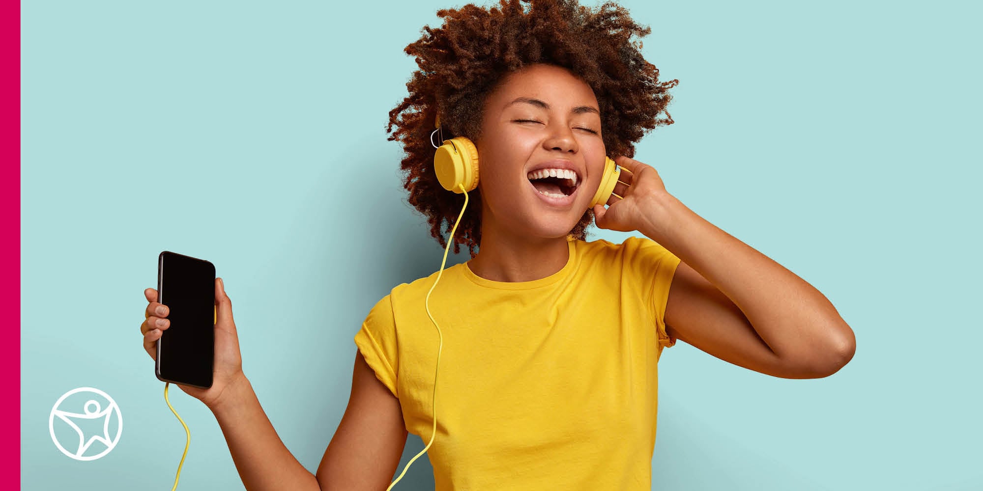 teenage girl with headphones and phone sings