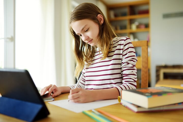 A girl takes a practice test to reduce test anxiety