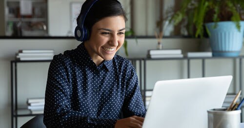 Online school counselor speaks with student over virtual conference to help them determine how to graduate early from high school